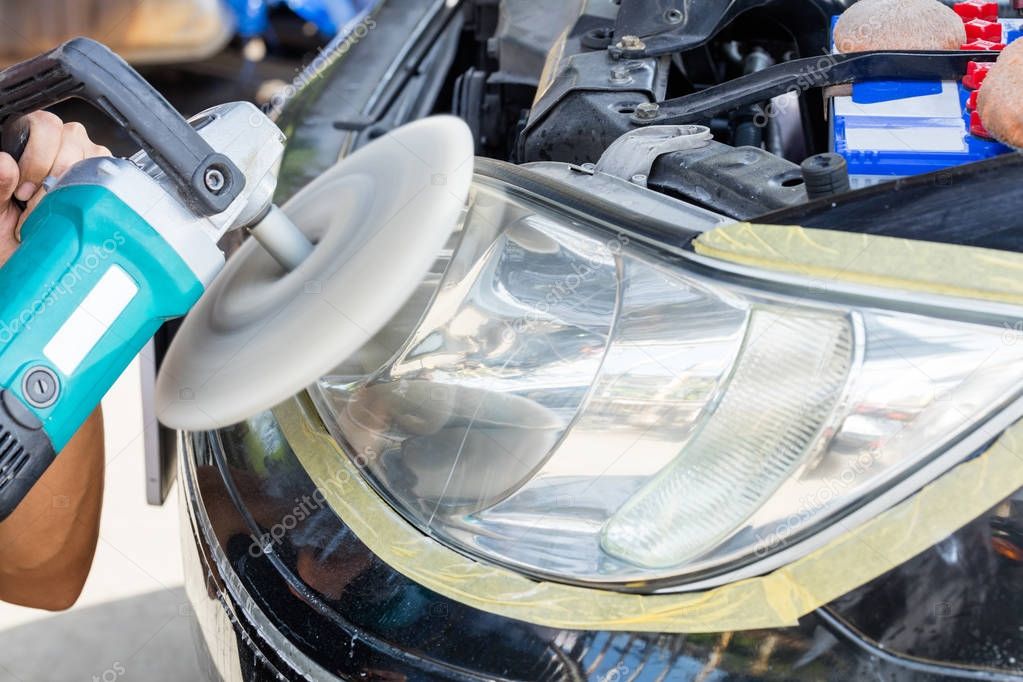 Close up car lamp or front headlight polishing, renewed headlamp