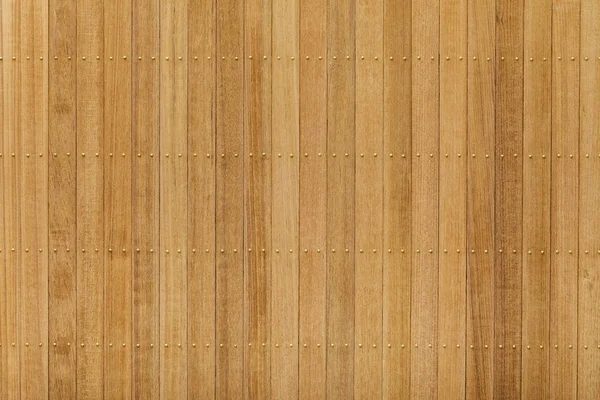 Teak wood panel with brass nail — Stock Photo, Image