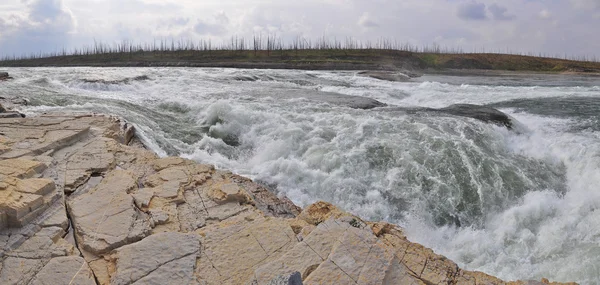 stock image Rocky rapids on a Northern river. 