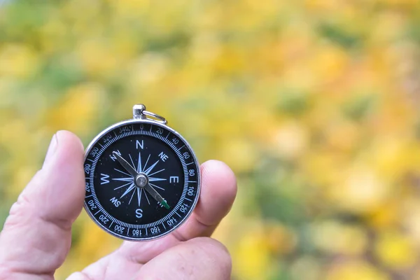 Compass in hand. — Stock Photo, Image