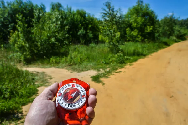 Compass in hand. — Stock Photo, Image