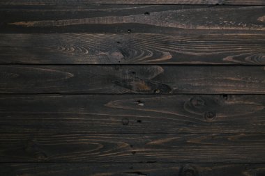 Koyu kahverengi eskimiş ahşap kaplama arka plan. Batı tarzı ahşap ahşap doku. Boş alan, metin için yer, kopyala.