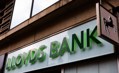 LONDON, UK - FEBRUARY 20, 2020: Lloyds bank logo on facade of branch on Oxford street. Lloyds Bank plc has traditionally been considered one of the 
