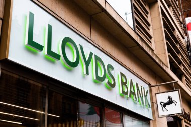 LONDON, UK - FEBRUARY 20, 2020: Lloyds bank logo on facade of branch on Oxford street. Lloyds Bank plc has traditionally been considered one of the 