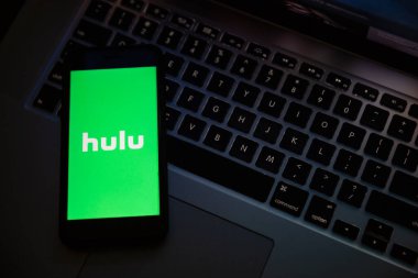 TERNOPIL, UKRAINE - JANUARY 11, 2020: Hulu brand logo on black screen of Apple iPhone 7 in the evening. Hulu is a global video streaming service.