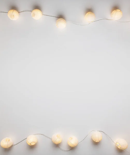 Shining Electric Garland White Background Christmas Decoration Concept Vertical Holiday — Stock Photo, Image