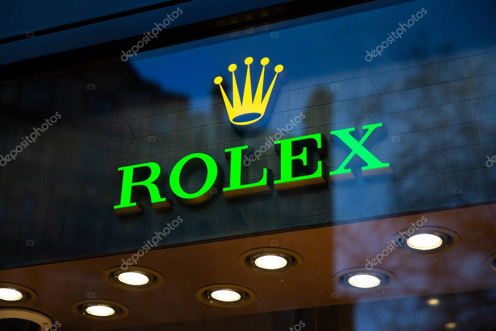 LONDON, UK - FEBRUARY 20, 2020: Rolex watch brand logo on exterior of the store.