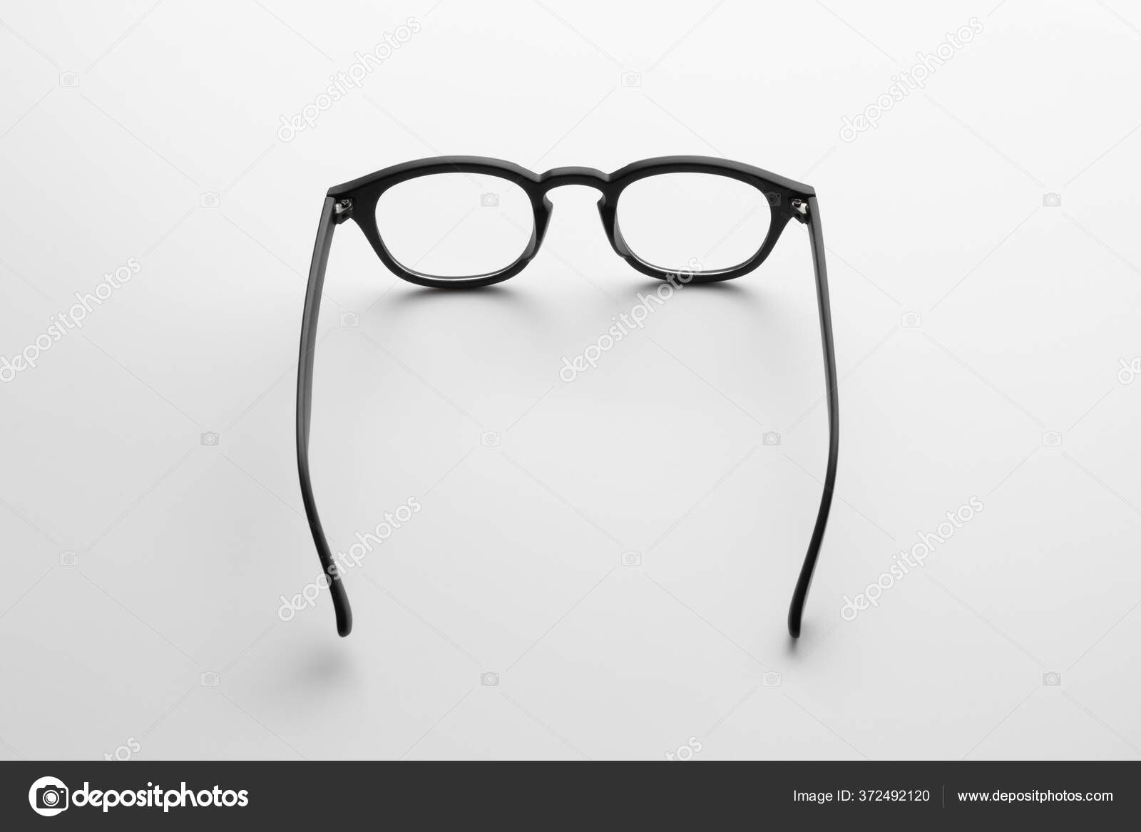 Closeup Rear View Modern Hipster Eyeglasses Abstract White Background