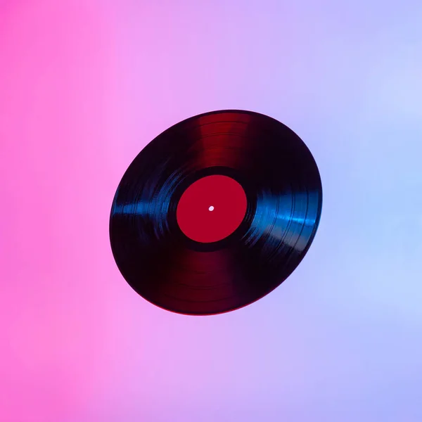 Black Vinyl Disc Lit Colorful Light Copy Space Creative Minimal — Stock Photo, Image