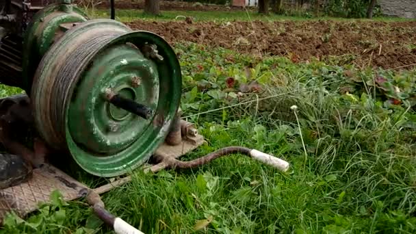 Electric winch and hand plow for plowing — Stock Video