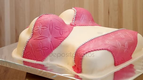 Cake in the shape of torso of woman's body — Stock Video