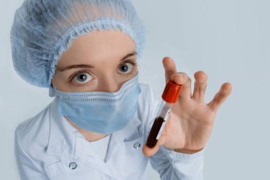 Positive blood sample for Coronavirus testing in doctors hand. Respiratory syndrome, Wuhan,China