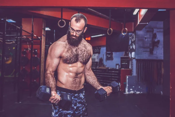 Young Bearded Man Glasses Naked Torso Doing Exercise Lifting Dumbbell — Stock Photo, Image