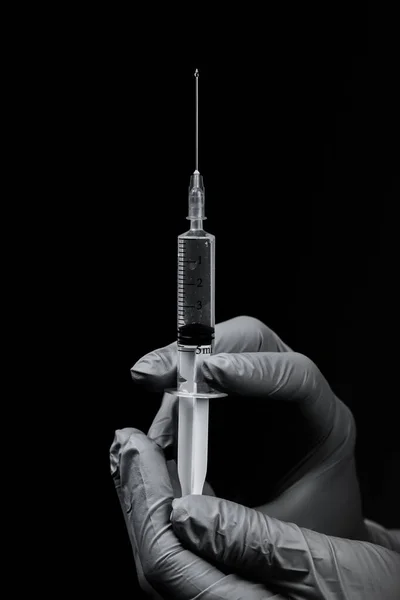 Medical Syringe Close Doctor Sterile Gloves Injection Vaccination Black Background — 스톡 사진