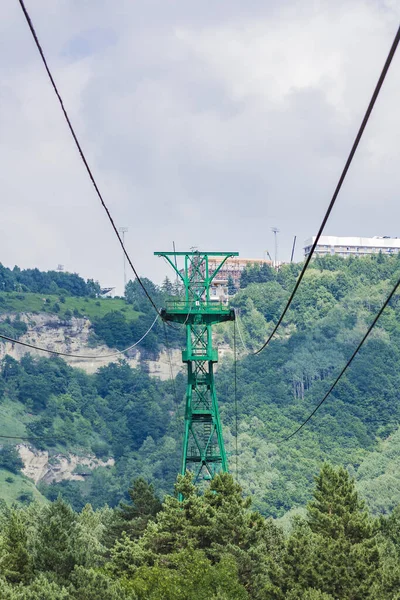Cable car support with load-bearing ropes. The support is installed on a high-altitude area.