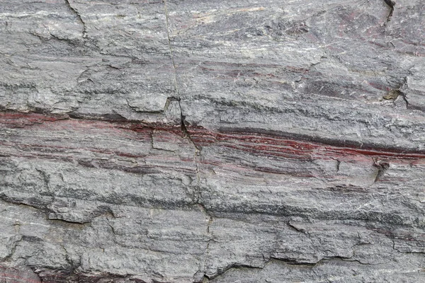 Layers of sedimentary rock formed on the earth's surface.