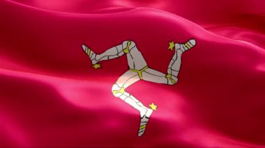 Rüzgarda sallanan Man Adası bayrağı. 4K Yüksek Çözünürlük Tam HD. Uluslararası Man Adası Bayrağının Döngüleme Videosu.