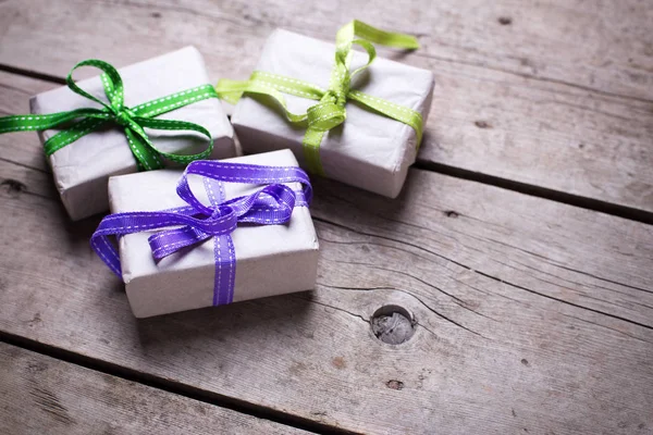 Festive gift boxes with presents — Stock Photo, Image