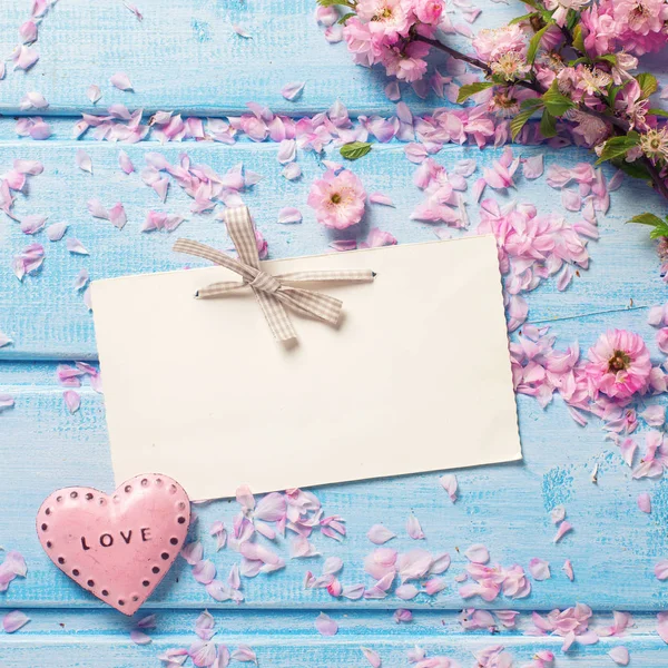 Pink  sakura flowers and heart — Stock Photo, Image