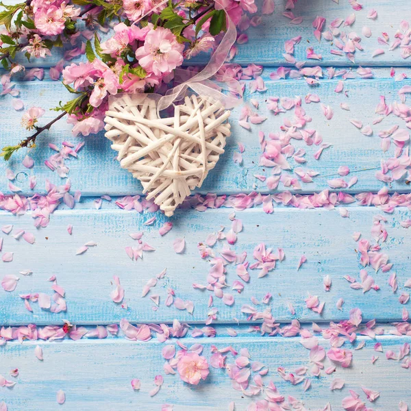 Pink  sakura flowers and heart — Stock Photo, Image