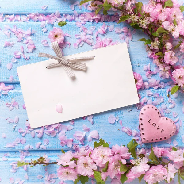Pink  sakura flowers and heart — Stock Photo, Image