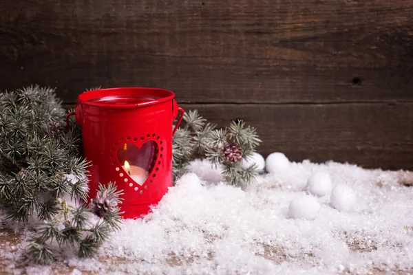 Candle in red lantern  and branches fir tree — Stock Photo, Image
