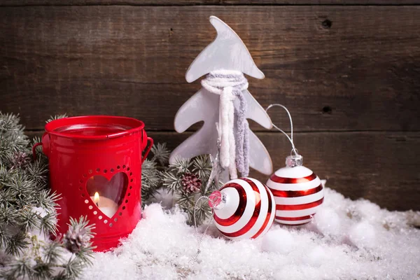 Candle in red lantern  and branches fir tree — Stock Photo, Image