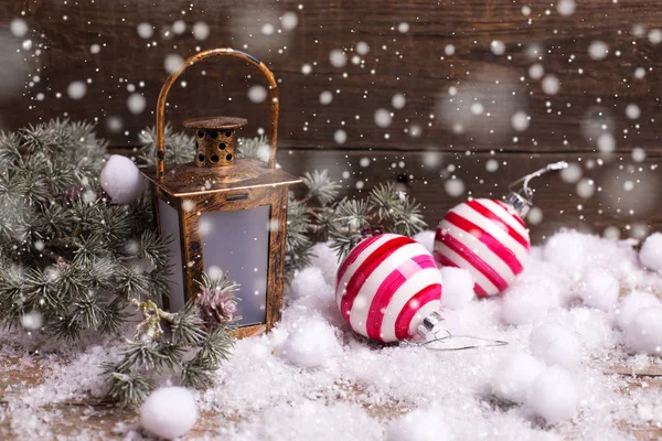 Christmas balls, candle in  decorative lantern — Stock Photo, Image