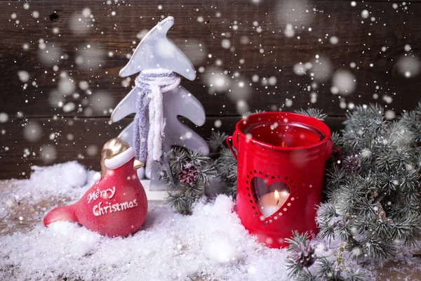 Decorative bird, candle in red lantern — Stock Photo, Image