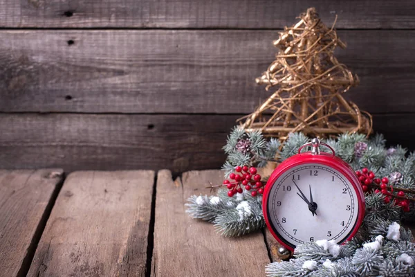 Clock, berries and branches