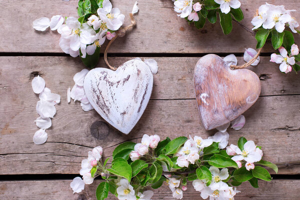 Decorative hearts and apple tree flowers 