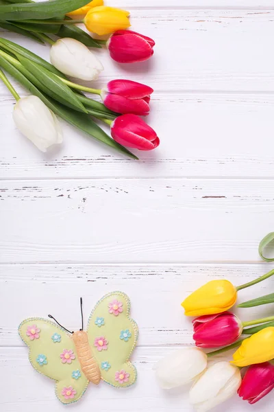 Frame from bright yellow, pink  and white tulips — Stock Photo, Image