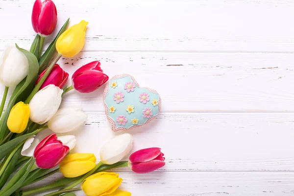 Tulips flowers and heart — Stock Photo, Image