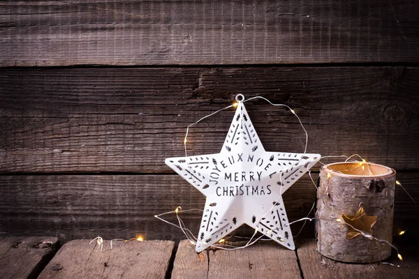 Kerstster, kaarsenstandaard en fairy licht — Stockfoto