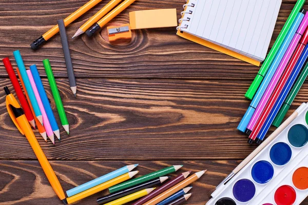 Pencils Pen Note Eraser Paint Wooden Background Top View — Stock Photo, Image