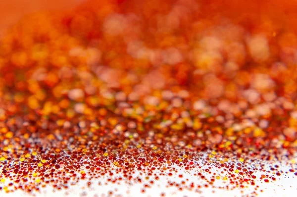 Orange glitter shiny abstract background, for party, beauty studio or celebration