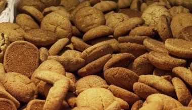 Close-up of many cherry biscuits on display