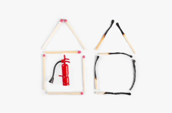 Two Houses Made Burnt Unburned Matches Miniature Fire Extinguisher Undemaged — Stock Photo, Image