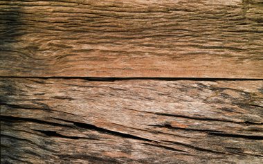 Çürük yüzeyi olan eski kahverengi ahşabı kapat, arkaplan için soyut doku.