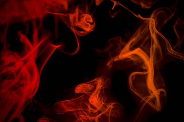 Abstract of red glow smoke, isolated for black background.