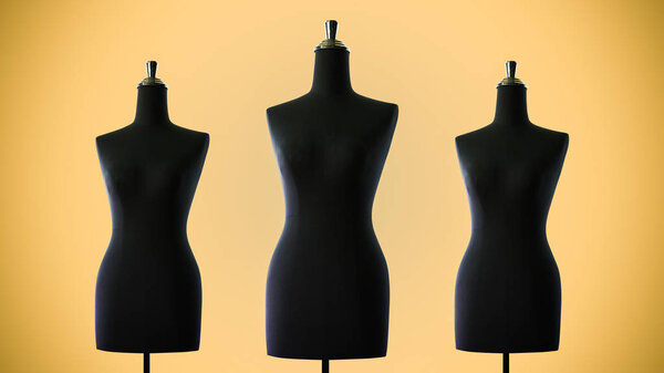 Черные платья манекены модели макет, изолированные на желтом фоне
.