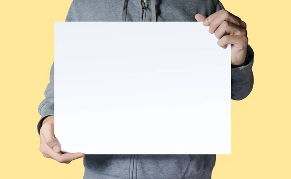 Gray Hood Jacket Man Holding White Empty Space Text Type — Stock Photo, Image