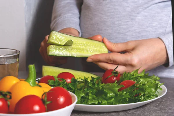 Pregnant woman and vegetables. Healthy food concept.