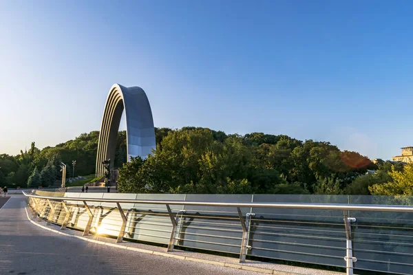 The view on the arch of the friendship of nations from the new Footstep bridge