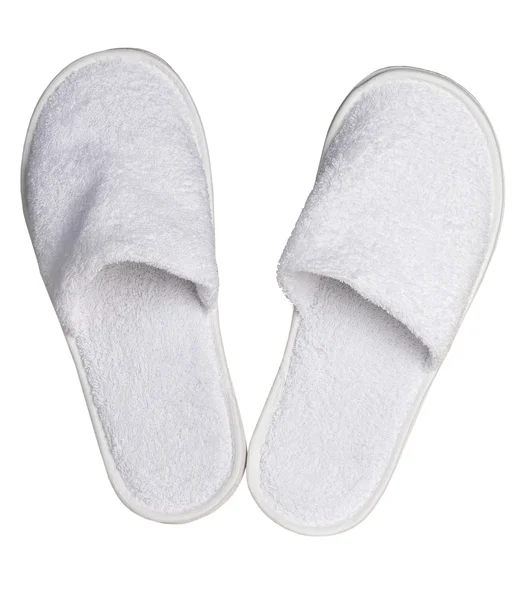Bílé froté pantofle izolovaných na bílém pozadí — Stock fotografie