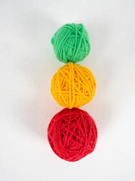 Multicolored yarn balls on white background — Stock Photo, Image