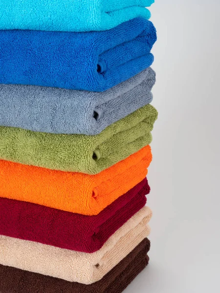 Closeup multicolored stack of towels — Stock Photo, Image