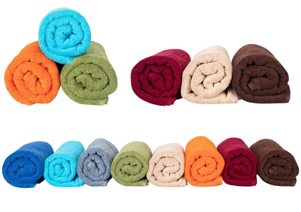 Multicolored towels isolated on white background — 스톡 사진