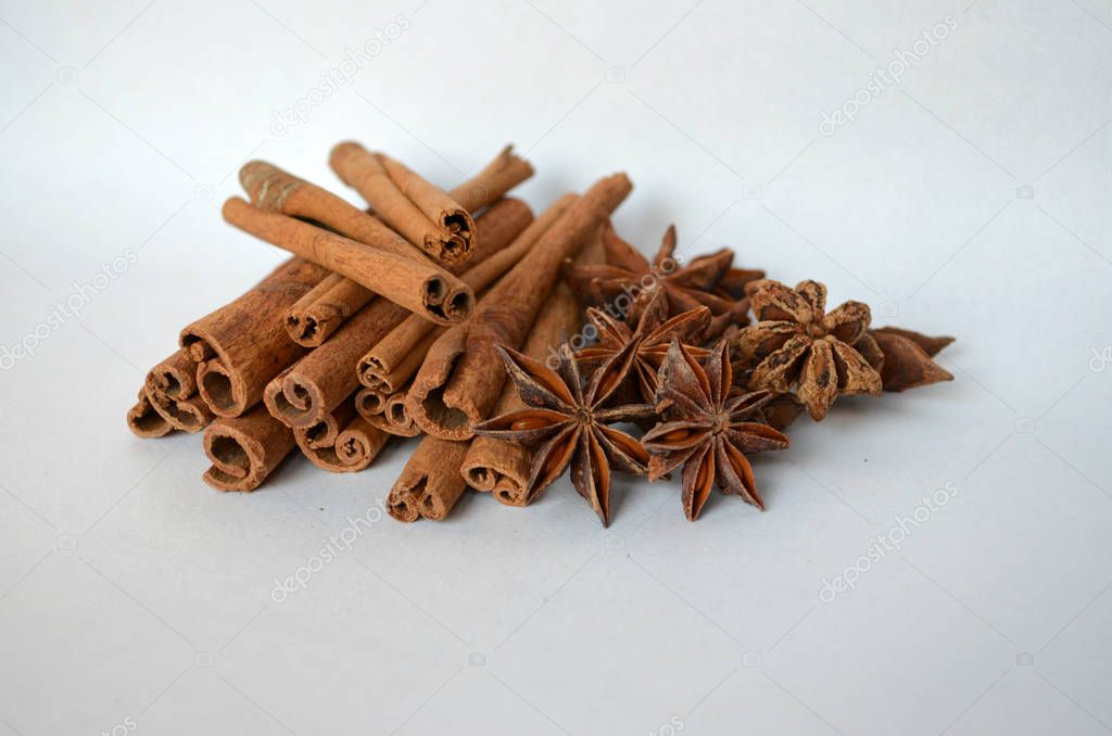 cinnamon and star anise spice on white background