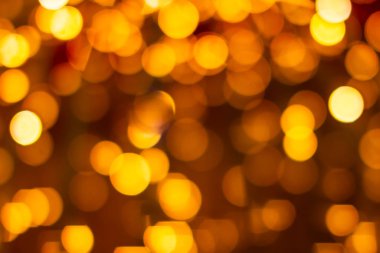 Turuncu bokeh bulanık ışıkları söndürdü. Soyut arkaplan
